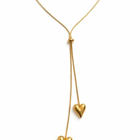 Collar doble corazón dorado en acero inoxidable con diseño en Y sobre fondo blanco