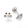 Pendientes mini cangrejo plata con perla fondo blanco