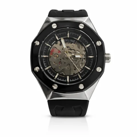 Reloj automático Skyline Nova plateado con esfera visible y correa de caucho negro sobre fondo blanco.